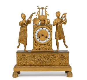 An antique French mantle clock in ornate figural ormolu case depicting minstrels, eight day time and bell striking movement with enamel chaptering and Roman numerals, 19th century, 41cm high.