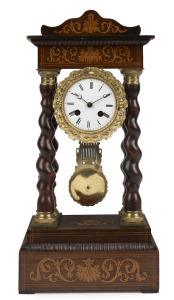 An antique French portico clock in rosewood case with marquetry decoration, eight day time and bell striking movement with Roman numerals, 19th century, 44cm high.