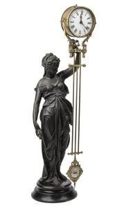 An antique French figural spelter mystery swinging clock, 19th century, 71cm high overall.