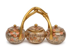 KINKOZAN SATSUMA antique Japanese earthenware three-sectional lidded pot, finely decorated with chrysanthemums and samurai court scenes, Meiji period, 19th century, signed three times on the underside of each of the lids , 11cm high, 17.5cm wide.