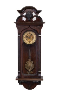 An antique wall clock in timber case with eight day time and gong striking movement plus Art Nouveau pressed metal dial and pendulum with Arabic chapter ring, 19th/20th century, bearing Swedish retailer's plaque, ​​​​​​​92cm high.