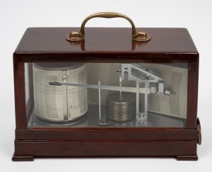 A vintage English cased barograph with eight day revolving recording drum, the aneroid mechanism with ten sealed bellows, manufactured by Casella, London, circa 1960, 24cm high handle up, 31cm wide, 16cm deep.