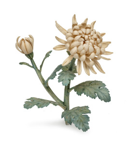 A fine quality antique Chinese carved ivory flower ornament with hand-painted finish, 19th century, ​​​​​​​signature seal mark to base, 17cm long.