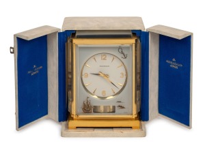 JAEGER LE COULTRE "MARINA ATMOS" fine quality vintage clock with polished brass frame and lacquered case, lucite panels with nautical themed embellishments. White one piece dial with gilt batons and Arabic numerals, fine order with original travelling cas
