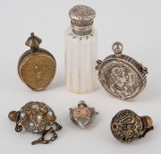 Six assorted antique scent bottles, gilt metal, silver and glass, 19th/20th century, ​​​​​​​the largest 5cm high.
