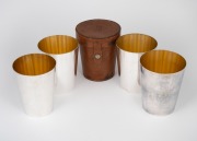 ASPREY & Co. of London fine quality set of four silver plated beakers with gilt wash interiors, housed in original leather campaign case, 19th/20th century, ​​​​​​​10cm high.