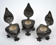 A rare set of three pewter grotesque bird jars with coloured porcelain linings, 19th/20th century, 11cm high. - 2