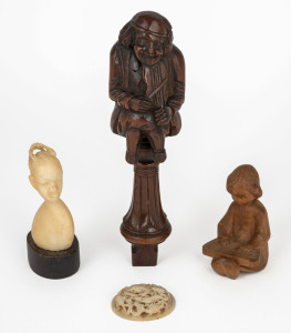 An 18th century carved wooden figural nutcracker, a carved wooden figure of a young girl, an African carved ivory bust and an antique Chinese carved ivory plaque, (4 items), the largest 15.5cm high.