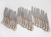 Sheffield sterling silver pistol grip cutlery, comprising of twelve dinner knives and ten entree knives, manufactured in Sheffield, circa 1977, (22 items).