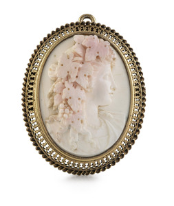 An antique oval cameo brooch with yellow plated gold filigree mount, 19th century, 5.5cm high, 24 grams total.