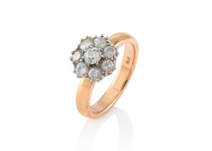 A vintage 14ct gold and diamond cluster ring, 20th century, stamped "14ct", 4.9 grams.