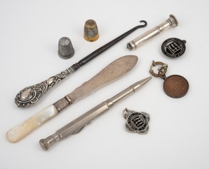 Sterling silver lace hook, pate knife and cigar punch, together with two metal thimbles, a vintage pen and three rowing fobs (one in sterling silver), 19th and 20th century, (9 items), the largest 17cm long.