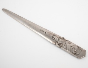 A vintage solid sterling silver armorial paper knife by Walker & Hall of Sheffield, circa 1903, 19.5cm long, 60 grams.