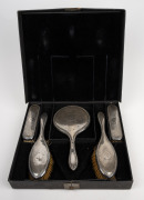 A five piece sterling silver vanity set with mirror and brushes, housed in original fitted box, made in Birmingham, early 20th century, the box 33cm wide. - 2