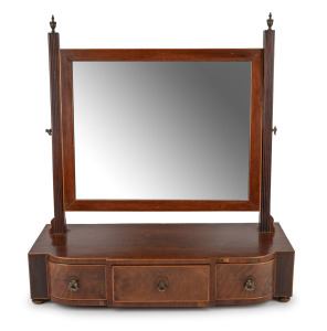 A Georgian English three drawer mahogany toilet mirror with boxwood string inlay, early 19th century, 59cm high, 55cm wide, 24cm deep.