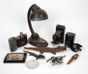 Vintage cameras, nutcrackers, hip flasks, bottle opener, table lamp etc., (12 items), the largest nutcracker 35cm long.