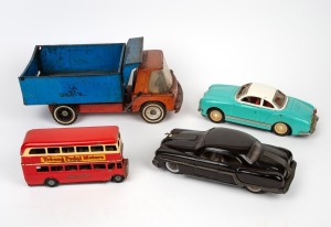 Four assorted metal and tin plate vintage toys, 20th century, the largest 30cm long.