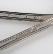Antique English sterling silver king's pattern cutlery, including servers, ladle, spoons and forks, (30 items), ​​​​​​​2,578 grams total. - 2