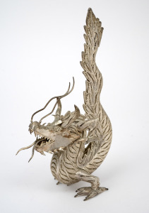 A Thai silver filigree dragon statue, 20th century, 17cm high, 115 grams.