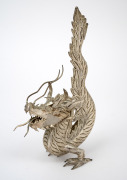 A Thai silver filigree dragon statue, 20th century, 17cm high, 115 grams.