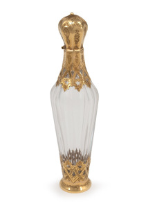 An antique French faceted crystal scent bottle with 14ct gold mounts, retaining original internal stopper, 19th century, 12cm high.