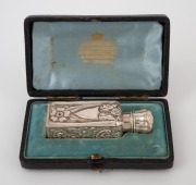An antique English sterling silver square form scent bottle with chased and engraved floral decoration, housed in original fitted box, manufactured by Arthur Pennington of Birmingham, circa 1892, 7.5cm high. - 2