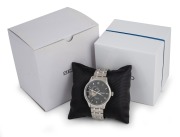 SEIKO "Presage" automatic wristwatch with skeleton back, in stainless steel case with original bracelet, housed in original box with additional links.