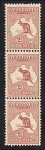 Kangaroos - CofA Watermark: 2/- Maroon (SG.134) vertical strip of 3, the top unit with "White flaw in Gulf og Carpentaria" variety; the middle unit with "Flaw on S of AUSTRALIA" variety, MUH. BW:40(2)h + j.