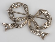 An antique white gold and diamond bow brooch, early 20th century, ​​​​​​​3.5cm wide, 5 grams. - 2