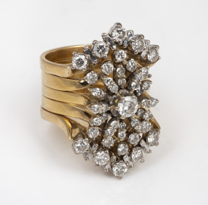 A vintage 18ct gold and diamond cocktail ring, mid 20th century, an imposing 19 grams.