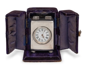 An antique sterling silver cased miniature clock with French movement in English case, retailed by J.R. ROWLAND of Melbourne and housed in original plush case with embossed retailer's details to the base, circa 1900, 10.5cm high (handle up).