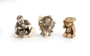 Three vintage Japanese carved ivory netsukes, including a fine example of a figure with sword, early to mid 20th century, the largest 4cm high.