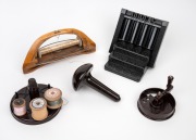 Bakelite darning mushroom, Patwin bakelite wool cutter, bakelite sewing stand, treen loom weaving shuttle and a bakelite stand, 20th century, (5 items), the shuttle 19.5cm wide.