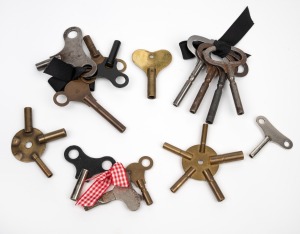 Fifteen assorted antique and vintage clock keys.