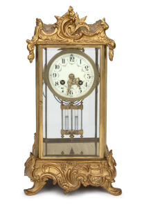 An antique French four glass library clock in attractive gilt bronze case with eight day time and gong strike movement by SAMUEL MARTI, mercury compensated pendulum, enamel dial and Arabic numerals, 19th century, 39cm high.