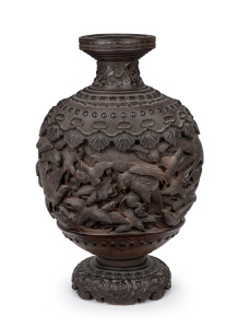 An exceptional exhibition quality antique Japanese carved wooden vase adorned with bird motif inset with glass eyes, Meiji period, 19th century, 36cm high.