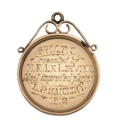 ST MARK'S FOOTBALL CLUB (PORT PIRIE): Prize medal in gold (9ct; 8.32g), scroll and ring top suspension, reverse inscribed, "St M.F.C. - Presented by H.E.Le Lievre. - Most improved player - L.P.Sandcry - 1912"; condition EF. - 2