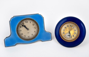 Two vintage blue guilloche enamel bedside clocks, one in sterling silver, the other in gilt metal, both with Swiss timepiece movements, early 20th century, ​​​​​​​the larger 7cm high, 12cm wide.
