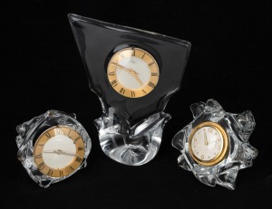 CRISTALLERIE SCHNEIDER group of three French crystal table clocks, two with eight day timepiece movements, the other with alarm, mid 20th century, ​​​​​​​the largest 23cm high.