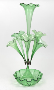 An antique English green glass epergne with seven trumpets, 19th century, 63cm high.