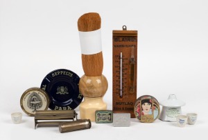 Novelty point of sale oversized shaving brush, black Americana circular playing cards in original tin, Seppelts advertising enamel ashtray, Blair's Varnishes advertising thermometer, gramophone needle cases, cigarette rolling devices, Ojos Negros powder b