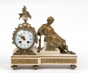 An antique French figural mantle clock in white marble and ormolu case, eight day time and bell strike movement with Roman numerals, late 19th century, 32cm high, 33cm wide.