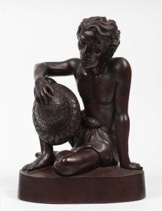 A vintage Balinese timber carving of a man, signed "MD. Planti. Bali", 20th century, 31cm high