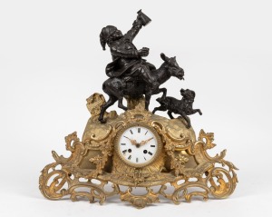 An antique French mantle clock in ornate ormolu case with figural bronze top of a drunken man riding on a donkey with his dog, eight day time and strike movement with enamel dial and Roman numerals, 19th century, note: missing pendulum, key and bell, 47cm