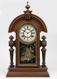 ANSONIA antique American mantle clock in walnut case, eight day time and gong strike movement with Roman numerals, 19th century, ​​​​​​​60cm high.