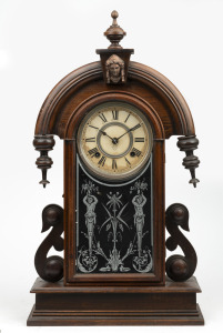 ANSONIA antique American mantle clock in walnut case, eight day time and gong strike movement with paper dial and Roman numerals, 19th century, 60cm high.