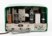A.W.A. RADIOLA vintage mantle radio in green case, A/F, 18cm high. - 2