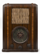 HEALING "Golden Voice" tombstone mantle radio in walnut case, 45cm high.