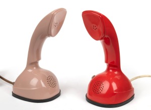 ERICSSON two vintage coloured plastic "Cobra" phones, 21.5cm high.
