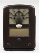HIS MASTER VOICE tombstone mantle radio in brown bakelite case, ​​​​​​​40cm high.
